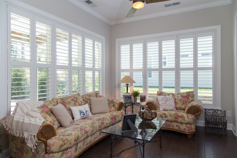 Sunroom with faux wood shutters in Clearwater.